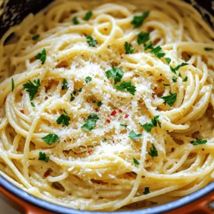 - 8 ounces of spaghetti or your choice of pasta - 4 cups vegetable broth - 1 cup heavy cream - 6 cloves garlic, minced - 1 cup grated Parmesan cheese - 2 tablespoons olive oil - 1 teaspoon red pepper flakes (optional) - Fresh parsley, chopped (for garnish) - Large pot or deep skillet - Stirring utensil - Measuring cups and spoons Gather these ingredients before you start cooking. Each item adds to the creamy, savory taste of this dish. The garlic brings a wonderful aroma, while the Parmesan gives it richness. You can swap the pasta for your favorite type. The vegetable broth keeps it light, but feel free to use chicken broth if you prefer. The optional olive oil adds depth, and red pepper flakes can give it a spicy kick. For tools, a large pot or deep skillet works best to hold all the pasta and sauce. A good stirring utensil is a must to mix everything well. Measuring cups and spoons will help you get the amounts just right. Ready to cook? Check out the Full Recipe for step-by-step instructions. 1. Start by heating 2 tablespoons of olive oil in a large pot over medium heat. 2. Add 6 minced garlic cloves to the pot. If you like spice, toss in 1 teaspoon of red pepper flakes. Sauté for 1-2 minutes. You want the garlic fragrant but not browned. 3. Next, pour in 4 cups of vegetable broth. Stir well, then add 8 ounces of spaghetti or your chosen pasta. 1. Bring the mixture to a boil. Once it bubbles, lower the heat to medium-low. 2. Cook the pasta for about 9-12 minutes. Stir it occasionally to keep it from sticking. You want the pasta al dente, with most of the liquid absorbed. 1. Reduce the heat to low and stir in 1 cup of heavy cream and 1 cup of grated Parmesan cheese. Mix until the cheese melts and the sauce thickens. 2. Season with salt and pepper to taste. 3. Let the pasta rest for a few minutes. This helps the flavors blend. 4. Serve warm, garnished with chopped parsley and an extra sprinkle of Parmesan if you like. For the full recipe, check out the details provided. To get the right al dente texture, cook your pasta until it is firm but not hard. The pasta will keep cooking after you drain it. Start tasting at about 9 minutes. Season your cooking water well. This will add flavor to your pasta. Use about a tablespoon of salt per quart of water. Avoid overcooking the pasta by stirring it often. If you see the pasta is too soft, it’s too late! To ensure a creamy sauce, add the cheese at the end. Stir it in slowly to help it melt evenly. If your sauce looks too thick, add a bit more broth or cream. Think about adding fresh herbs like basil or thyme. They can brighten up the dish. For presentation, serve your pasta in bowls. Top it with extra Parmesan and fresh parsley. This makes it look lovely and inviting! You can find the full recipe for One-Pot Garlic Parmesan Pasta to guide you through the steps. {{image_2}} You can easily switch up the pasta in this dish. Try gluten-free pasta if you need it. Many brands offer tasty options that still cook well in one pot. For a creamy texture without dairy, use coconut milk or cashew cream. These options keep the dish rich and tasty while meeting dietary needs. Want to boost protein? Add cooked chicken, shrimp, or even chickpeas. They mix well and make your meal heartier. Adding veggies is a great way to get more nutrients. Spinach, broccoli, or bell peppers fit nicely in this pasta dish. Just toss them in with the pasta as it cooks for a colorful and healthy twist. Pair this pasta with a fresh salad or garlic bread for a full meal. A simple green salad with lemon vinaigrette complements the creamy pasta. Be bold and serve it baked! After cooking, transfer the pasta to a baking dish, top with more cheese, and bake until golden. This adds a fun texture and flavor. For more ideas, check the Full Recipe to explore all your options! After you enjoy your one-pot garlic Parmesan pasta, store leftovers in the fridge. Use an airtight container for best results. This keeps the pasta fresh for up to three days. To freeze leftover pasta, let it cool first. Then, place it in a freezer-safe bag or container. Press out as much air as possible. This method can keep your pasta good for about three months. When you're ready to eat the leftovers, you want to reheat them well. The best way is on the stovetop. Place the pasta in a pan, add a splash of water or broth, and heat it over low to medium heat. Stir often to keep it moist. You can also use a microwave for quick reheating. Put the pasta in a microwave-safe bowl. Add a little water, cover it with a lid or a damp paper towel, and heat in short bursts. Stir in between bursts to avoid dry spots. For freshness, your one-pot garlic Parmesan pasta lasts about three days in the fridge. If you freeze it, aim to eat it within three months for the best taste. Watch for signs of spoilage. If the pasta smells off, looks discolored, or has mold, it's time to toss it. Always trust your nose and eyes when checking food. - How long does it take to prepare One-Pot Garlic Parmesan Pasta? It takes about 10 minutes to prep and 25 minutes to cook. So, in just 35 minutes, you can enjoy a tasty meal. - Can I make this recipe in advance? Yes, you can make it ahead. Just cook the pasta, let it cool, and store it in the fridge. Reheat it when you're ready to eat. - Is this recipe suitable for a vegetarian diet? Absolutely! This pasta dish uses vegetable broth, making it perfect for vegetarians. - Can I make it gluten-free? Yes, you can! Just swap out regular pasta for your favorite gluten-free pasta. It will taste great. - What if my sauce is too thick or too thin? If the sauce is too thick, add a little more broth or cream. If it's too thin, let it cook a bit longer to thicken up. - How do I adjust the recipe for fewer servings? Simply cut the ingredients in half. This works well and keeps the taste just right. This blog post covered simple steps to make a delicious One-Pot Garlic Parmesan Pasta. We explored essential and optional ingredients, tools needed, and cooking tips. I shared easy ways to enhance flavor and prevent common mistakes. Variations let you swap ingredients or add proteins for more options. Plus, I included storage tips to save leftovers. Now, you can make this dish your own. Enjoy the process and savor the results!