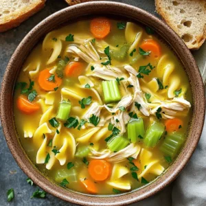 To make a great chicken noodle soup, you need simple, fresh ingredients. Here’s what you need: - 1 tablespoon olive oil - 1 medium onion, chopped - 2 cloves garlic, minced - 2 medium carrots, diced - 2 celery stalks, diced - 1 teaspoon dried thyme - 1 teaspoon dried rosemary - 6 cups chicken broth - 2 cups cooked chicken, shredded - 2 cups egg noodles - Salt and pepper to taste - 1 tablespoon fresh parsley, chopped (for garnish) These ingredients create a warm and tasty soup. The chicken broth gives it depth. Fresh veggies add crunch and color. To cook your chicken noodle soup, you’ll need a few basic tools: - Large pot - Cutting board - Sharp knife - Wooden spoon - Measuring spoons - Ladle - Serving bowls These tools will help you prepare and serve your soup easily. A large pot is key for making enough soup for everyone. Using fresh herbs and spices can boost flavor. Here are some great options: - Fresh parsley - Bay leaves - Fresh thyme - Fresh rosemary Adding these fresh herbs gives your soup a vibrant taste. They make your dish feel special and fresh. For a unique twist, try adding a squeeze of lemon for brightness. This will enhance the flavors and make every spoonful delightful. For the full recipe, check out the instructions later. Start by gathering all your ingredients. You will need: - 1 tablespoon olive oil - 1 medium onion, chopped - 2 cloves garlic, minced - 2 medium carrots, diced - 2 celery stalks, diced - 1 teaspoon dried thyme - 1 teaspoon dried rosemary - 6 cups chicken broth - 2 cups cooked chicken, shredded - 2 cups egg noodles - Salt and pepper to taste - 1 tablespoon fresh parsley, chopped (for garnish) Chop the onion, carrots, and celery. Mince the garlic. This helps the flavors mix well. In a large pot, heat the olive oil over medium heat. Add the chopped onion. Sauté until it turns translucent. This takes about 3-4 minutes. Stir in the minced garlic, diced carrots, and diced celery. Cook for another 5 minutes. Stir often. You want the veggies to soften. Next, add the dried thyme and rosemary. Mix these herbs in well. They add nice flavor to your soup. Pour in the chicken broth and bring it to a boil. Once boiling, reduce the heat to a simmer. This is where the magic happens! Add the shredded chicken and let it simmer for about 15 minutes. This allows the flavors to meld together beautifully. Now, stir in the egg noodles. Cook for an additional 8-10 minutes. Check the noodles to ensure they are tender. After that, season the soup with salt and pepper to taste. Remove the pot from heat. Garnish with fresh chopped parsley. Your soup is now ready! Serve it in warm bowls with crusty bread on the side. This classic chicken noodle soup is the perfect comfort food. For the full recipe, check out the earlier section. To boost the flavor of your chicken noodle soup, consider adding more veggies. You can try peas, corn, or even spinach. Each of these adds great taste and color. A splash of lemon juice brightens the soup, making it fresh. For spice lovers, a pinch of red pepper flakes adds warmth. If you want a richer taste, a tablespoon of soy sauce works wonders. Each ingredient brings its own charm and makes the soup your own. Cooking noodles right is key to a tasty soup. Add the noodles when the soup is almost done. This keeps them from getting too soft. For egg noodles, about 8 to 10 minutes is perfect. Test them a minute or two early. They should be tender but not mushy. If you cook them too long, the noodles soak up too much broth. Then your soup could turn thick and less enjoyable. Leftover chicken is a great time-saver for this soup. Shred any cooked chicken you have and add it to the pot. This cuts down on prep time and still gives great flavor. You can use rotisserie chicken, grilled chicken, or even baked chicken. Just make sure to warm it through before serving. This way, you get a hearty meal with little effort. It’s a clever way to make a quick dinner when you’re busy. {{image_2}} You can make chicken noodle soup healthier by lowering the sodium. Choose low-sodium chicken broth. This lets you control the salt. You can also swap the egg noodles for gluten-free noodles. Look for rice or quinoa noodles. These options keep the soup tasty while being kinder to your body. You can give your soup a global spin! Try adding ginger and lemongrass for a Thai vibe. For a Mexican twist, add lime juice and cilantro. A hint of curry powder gives it an Indian flair. Each change brings a new flavor without losing the comfort of the classic soup. Adding veggies boosts health and flavor. You can toss in spinach or kale for extra greens. Peas and green beans add color and sweetness. Try zucchini or bell peppers for a crunchy texture. Each bite becomes more nutritious and exciting. Plus, these additions make the soup even more filling! To store your chicken noodle soup, let it cool first. Once cool, transfer it to an airtight container. This keeps the soup fresh for up to three days in the fridge. Make sure the lid is tight to prevent spills or strong odors from getting in. Label the container with the date, so you know when you made it. If you want to save the soup for later, freezing is a great option. Pour the cooled soup into freezer-safe bags or containers. Leave some space at the top for expansion. Seal the bags tightly and label them with the date. Your soup can last up to three months in the freezer. For best results, avoid freezing the noodles. They can get mushy when thawed. When you are ready to enjoy the soup, reheat it gently. Pour the soup into a pot and warm it over medium heat. Stir it often to make sure it heats evenly. If the soup is too thick, add a splash of broth or water. You can also microwave it in a bowl with a cover, stirring halfway through. This keeps the flavor fresh and delicious. I recommend using boneless, skinless chicken breasts or thighs. Thighs give more flavor. You can also use a whole chicken for richer broth. Cooking the chicken first helps create a tasty base. Yes, you can! Just add all your ingredients to the slow cooker. Set it on low for 6-8 hours or high for 3-4 hours. This method lets flavors blend well and makes it super easy. Chicken noodle soup lasts about 3-4 days in the fridge. Make sure to store it in an airtight container. To keep it fresh longer, let it cool before putting it in the fridge. Serve your soup with crusty bread or crackers for dipping. A side salad also pairs well. You can even add a simple fruit dish for a fresh touch. Yes, you can use any type of noodle you like! Egg noodles are classic, but you can try rice noodles or whole wheat pasta. Just adjust the cooking time based on the noodle type. For the full recipe, check the section above. In this article, we covered how to make classic chicken noodle soup. We discussed essential ingredients, tools, and herbs that add flavor. You learned simple steps to prepare and cook the soup. Tips for enhancing flavor, timing noodles, and using leftovers help make it even better. We explored healthy alternatives and ways to store the soup properly. This dish is not just a meal; it's comfort in a bowl. Enjoy your homemade soup and get creative with your variations!