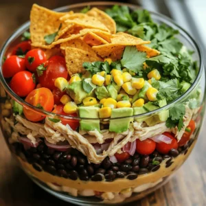 - 2 cups cooked and shredded chicken breast - 1 can (15 oz) black beans, rinsed and drained - 1 cup corn kernels (fresh or frozen) - 1 red bell pepper, diced - 1 avocado, diced - 1 cup cherry tomatoes, halved - 1 small red onion, finely chopped - 1/2 cup cilantro, chopped - Juice of 2 limes - 3 tablespoons olive oil - 1 tablespoon chili powder - 1 teaspoon cumin - Salt and pepper to taste - Tortilla chips (for serving) To make a tasty Southwest Chicken Salad, gather these fresh ingredients. The key is using cooked chicken. You can roast or grill it. Shredded chicken adds great texture. Black beans boost protein. They also bring fiber to your dish. Corn adds sweetness. Fresh or frozen works well. You need a red bell pepper for crunch and color. An avocado gives creaminess. Cherry tomatoes add juiciness. The red onion provides a bit of sharpness. Cilantro brings a fresh, herbal note. Limes offer the right zing. Olive oil keeps the salad light and fresh. Chili powder and cumin add warmth. Adjust salt and pepper to taste. This mix of ingredients makes a great base for our main dish. You can find the full recipe to guide you through making this savory delight. 1. In a large mixing bowl, combine: - 2 cups cooked and shredded chicken breast - 1 can (15 oz) black beans, rinsed and drained - 1 cup corn kernels (fresh or frozen) - 1 red bell pepper, diced - 1 avocado, diced - 1 cup cherry tomatoes, halved - 1 small red onion, finely chopped - 1/2 cup cilantro, chopped 2. In a small bowl, whisk together: - Juice of 2 limes - 3 tablespoons olive oil - 1 tablespoon chili powder - 1 teaspoon cumin - Salt and pepper to taste 3. Pour the dressing over the salad ingredients in the large bowl. Toss everything gently until well coated. - Let the salad sit for about 10 minutes. This helps the flavors blend. - Serve the salad in clear bowls or on a colorful platter. This shows off the vibrant colors. - Top with crispy tortilla chips for added crunch before serving. To make your Southwest Chicken Salad pop, try adding spices. A pinch of smoked paprika or cayenne can add a nice kick. Fresh herbs like parsley or oregano bring brightness. A simple marinade for the chicken can also boost flavor. Mix lime juice, olive oil, and spices. Let the chicken soak for 30 minutes before cooking. This step makes a big difference! If you want to switch things up, try different proteins. Grilled shrimp or steak work well in this salad. For a vegan option, use chickpeas or grilled tofu. Just ensure to season them well. You can follow the same dressing recipe for flavor. Pair your salad with fresh tortilla chips for a nice crunch. They add a fun texture. A light, refreshing drink works best. Try iced tea or a fruity soda. These choices complement the meal and make it more enjoyable. For a touch of elegance, serve the salad with a side of guacamole or salsa. For the full recipe, check the complete guide. {{image_2}} You can easily make this salad your own. Adding fruits like mango or pineapple brings a sweet twist. These fruits complement the savory flavors perfectly. Try diced peaches for a summer vibe. You can also switch up the beans. Use chickpeas or pinto beans for different tastes. This keeps the meal fresh and fun. The options are endless! Want to turn this salad into a wrap? It’s simple! Just take a large tortilla and fill it with the salad. You can add a spread to enhance the flavor. Try hummus or ranch dressing for a creamy touch. Salsa can give it a nice kick too. Fold the tortilla tightly and enjoy it on the go! Meal prepping this salad is easy. You can mix the salad ingredients and store them in the fridge. Just keep the dressing separate until you’re ready to eat. This keeps everything fresh and crunchy. Store the salad in a sealed container. It’s best to eat it within three days for the best taste. To keep your Southwest Chicken Salad fresh, store leftovers in the fridge. Use an airtight container. This helps keep the salad crisp and tasty. You can also store the dressing separately. This way, it won't make the salad soggy. If you want to freeze parts of the salad, freeze the chicken and beans. Chop the veggies fresh when you are ready to eat. In the fridge, your Southwest Chicken Salad lasts about three days. After that, the quality may drop. Watch for signs of spoilage. If you see any mold or a strange smell, toss it out. Freshness is key for the best taste! For the best flavor, eat it within this timeframe. You have many great options. You can use canned tuna or shrimp for a seafood twist. For a vegetarian version, try black beans or chickpeas. Tofu is also a good choice; just press it to remove water. You can even use grilled portobello mushrooms for a hearty bite. Each option brings its own flavor and protein. Yes, you can prepare this salad ahead of time. You can mix all the ingredients, except the avocado and tortilla chips, a day before. This helps the flavors blend well. Store it in an airtight container in the fridge. Just add the avocado and chips right before serving. This keeps everything fresh and crunchy. To kick up the heat, add diced jalapeños or a splash of hot sauce. You can also mix in diced green chilies for extra flavor. Another great option is to use spicy chili powder instead of regular. If you want even more heat, sprinkle in some cayenne pepper. Adjust the spice to suit your taste! This blog post covered a delicious Southwest Chicken Salad. We went through the key ingredients, like chicken, beans, and fresh veggies. I shared simple steps for preparation and serving, plus tips to enhance flavor. You can customize your salad easily and learn how to store leftovers. Remember, this meal is versatile and healthy. Enjoy experimenting with flavors. This salad can be a staple in your kitchen. Trust me, it will impress anyone who tries it!