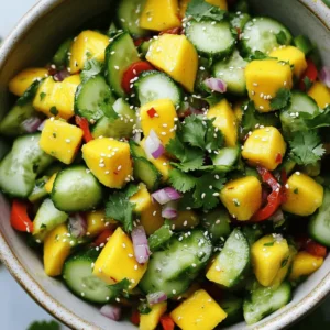 To make a spicy mango cucumber salad, gather these fresh ingredients: - 1 ripe mango, peeled and diced - 1 large cucumber, diced - 1 red bell pepper, diced - 1 small red onion, finely chopped - 1 to 2 red chilies, deseeded and finely chopped - 2 tablespoons lime juice - 1 tablespoon olive oil - Fresh cilantro leaves, chopped - Salt and pepper to taste These ingredients bring together sweet, spicy, and crunchy textures. The ripe mango adds sweetness, while the cucumber provides a refreshing crunch. The red bell pepper and onion contribute flavor and color, making the dish vibrant. If you want to change things up, consider these options: - Substitute mango with pineapple or peach for a twist. - Use zucchini or yellow squash instead of cucumber for variety. - Swap red bell pepper with green or yellow for a different taste. - Add herbs like mint or basil for extra flavor. These substitutions can keep your salad exciting and fresh. This salad is not only tasty but also healthy. Each serving has: - Approximately 120 calories - 3g of protein - 5g of fat - 18g of carbohydrates - 3g of fiber This salad is a great choice for a light lunch or a side dish. The mix of fruits and veggies gives you vitamins and minerals too. Enjoy the burst of flavors while keeping your meal nutritious! Step 1: Chopping Vegetables Start by peeling and dicing one ripe mango. Make sure you get nice, small pieces. Next, grab a large cucumber and dice it into similar-sized chunks. Then, take a red bell pepper, remove the seeds, and chop it up. Finally, finely chop one small red onion. The colors will really pop! Step 2: Making the Dressing In a small bowl, mix together one to two finely chopped red chilies, two tablespoons of lime juice, and one tablespoon of olive oil. Stir this well. This dressing adds the spicy kick and tangy flavor. Step 3: Combining Ingredients In a large mixing bowl, combine all your chopped vegetables. Pour the dressing over them and toss gently. Be careful not to bruise the ingredients. You want everything to stay fresh and crisp. How to toss ingredients without bruising To toss without bruising, use a gentle motion. Lift the ingredients from the bottom and turn them over. You want to coat everything without mashing it. Importance of letting flavors meld Let the salad sit for about 10 minutes before serving. This time helps the flavors blend nicely. You’ll be amazed at how much better it tastes! Garnishing with cilantro Right before serving, chop some fresh cilantro leaves and sprinkle them on top. This adds a burst of freshness and color. Presentation tips for serving Serve the salad in a chilled bowl for a nice touch. You can add extra slices of mango or cucumber on top for a pretty finish. A sprinkle of sesame seeds also gives a nice crunch. For the full recipe, check the detailed instructions above. Choosing ripe mangoes is key. Look for mangoes that feel soft but not mushy. The skin should have a nice color, usually a mix of green and yellow. A ripe mango will smell sweet at the stem end. For cucumbers, pick firm ones. They should be dark green and free of spots. Choose red bell peppers that are shiny and smooth. Fresh peppers add a crisp bite to the salad. You can add sweetness by mixing in a bit of honey or agave syrup. This pairs well with the spicy chilies. If you want more heat, add extra red chilies. For a fun twist, try adding sliced jalapeños. Pair this salad with grilled chicken or fish for a complete meal. It also works well as a side with tacos or burritos. To make this salad gluten-free, skip any sauces that contain gluten. This recipe is already vegan, but you can add chickpeas for extra protein. If you want to make it low-carb, use zucchini noodles instead of cucumbers. This keeps the crunch while cutting down on carbs. Check the [Full Recipe] for more ideas on how to customize your salad. {{image_2}} You can make this salad even better by adding more fruits. Pineapple brings a sweet and tangy flavor. Papaya adds a soft texture and a hint of sweetness. You can also mix in avocados for creaminess. They make the salad rich and filling. Each fruit adds its own twist. Consider adding nuts or seeds for crunch. Toasted cashews or sunflower seeds work great. They add a nice texture and flavor boost. You can also try different dressings. A honey-lime dressing gives a sweet touch. A spicy vinaigrette can add more heat. Change the dressing to match your taste. You can switch up the recipe based on the season. In summer, keep it light and fresh. Add juicy tomatoes or fresh herbs for a bright taste. In fall or winter, try roasted butternut squash or apples. These ingredients bring warmth and comfort. Adjust the salad to fit what is in season for the best flavors. If you're looking for the full recipe, check out the [Full Recipe] for all the details! To store leftover salad, place it in an airtight container. This keeps moisture in and air out. Make sure to seal it tightly. You can add a paper towel in the container to absorb excess moisture. This helps keep the ingredients crisp. To keep ingredients fresh, store any unused mango or cucumber separately. These can spoil quickly when mixed with dressing. If you plan to use them later, store them in the fridge. The salad lasts about three days in the fridge. After that, it may lose its taste and crunch. Always check for signs before eating. If the mango or cucumber looks soggy or has dark spots, it’s best to toss it. You should also look for any off smells. If it smells sour or unusual, do not eat it. Fresh ingredients are key to enjoying this dish. You can incorporate leftover salad into other meals. For example, add it to tacos or wrap it in a tortilla. It can also be a great topping on grilled chicken or fish. Transforming it into a salsa is another fun idea. Just chop the salad more finely and serve it with chips. You can also mix it into a grain bowl for extra flavor and crunch. These ideas keep meals exciting and reduce food waste. You can swap out mango for other fruits or vegetables. - Fruit alternatives: Pineapple and peach work well. They add sweetness and a juicy texture. - Vegetable options: Try using diced bell peppers or zucchini for a crunch without the fruit flavor. Yes, this salad can be spicy, depending on the chilies you use. - Adjusting heat levels: Use one chili for a mild taste or two for more heat. You can also remove the seeds for less spice. - Tips for non-spicy versions: Skip the chilies and add a touch of honey. It keeps the sweetness without the heat. The salad stays fresh for a short time. - Storage duration: It lasts up to 2 days in the fridge. After that, it can become soggy. - Best time to consume: Enjoy it within the first day for the best taste and crunch. Yes, you can prep it ahead of time. - Recommended time frames: Make it up to 4 hours before serving. This way, flavors blend well. - Storage tips prior to serving: Keep the dressing separate until just before you serve. This keeps the salad crisp. For the Full Recipe, please check the main article. This blog post guided you through making a spicy mango cucumber salad. I covered the essential ingredients and tips for choosing the best ones. You learned how to prepare and mix the salad while adjusting flavors to fit your taste. I also shared storage info and ways to use leftovers effectively. Enjoy experimenting with variations and substitutions to make this salad yours. With fresh ingredients and simple steps, your dish will shine. Happy cooking!