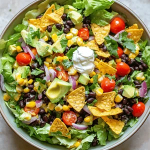 - 1 can black beans, rinsed and drained - 1 can corn, drained - 1 red bell pepper, diced - 1 cup cherry tomatoes, halved - 1 avocado, diced - 1 small red onion, finely chopped - 1 cup chopped romaine lettuce - Optional toppings: tortilla chips, vegan sour cream You will love the mix of beans and veggies. Black beans add protein and fiber. Corn brings sweetness and crunch. Fresh vegetables like red bell pepper and cherry tomatoes add color and taste. Avocado gives a creamy texture, while red onion adds a little bite. Romaine lettuce provides a nice crunch. - 1 teaspoon ground cumin - 1 teaspoon chili powder - Salt and pepper to taste - 1 lime, juiced - 1/4 cup fresh cilantro, chopped Seasonings make your taco salad pop. Ground cumin and chili powder give it warmth and depth. Lime juice adds brightness, while salt and pepper enhance the flavor. Fresh cilantro at the end adds a touch of freshness. - 1 cup tortilla chips, crushed (for topping) - 1/4 cup vegan sour cream (optional) For extra crunch, top your salad with tortilla chips. They add a fun texture. If you want creaminess, a dollop of vegan sour cream is perfect. You can find the full recipe for more details. Enjoy your vibrant vegan taco salad! To start, gather your fresh vegetables. Rinse them well under cool water. This helps remove dirt and pesticides. For the red bell pepper, chop it into small pieces. Halve the cherry tomatoes and dice the avocado. For the red onion, finely chop it. Now, wash the romaine lettuce and chop it into bite-sized pieces. Next, for the black beans, open the can. Pour the beans into a colander. Rinse them under cool water. Let them drain well. This step removes excess sodium and keeps your salad fresh. You can also do this with the corn. Drain it and set it aside. In a large mixing bowl, combine your prepared veggies. Add the rinsed black beans and corn. Next, toss in the diced avocado and chopped romaine. Gently mix all the ingredients together. This helps keep the veggies intact. If you toss too hard, you may mash the avocado. For the dressing, take a small bowl. Whisk together the lime juice, ground cumin, chili powder, salt, and pepper. Make sure it’s mixed well. Pour the dressing over the salad mixture. Gently toss it again to coat all the ingredients. Let the salad sit for about ten minutes. This allows the flavors to meld together. When you’re ready to serve, taste it. Adjust the seasoning if needed. Serve the salad in bowls or on a platter. Top it with crushed tortilla chips and fresh cilantro. You can also add a dollop of vegan sour cream if you like. For the complete recipe, check out the Full Recipe section. To make your vegan taco salad truly shine, start with ripe avocados. A good avocado should feel slightly soft but not mushy. For fresh produce, look for bright colors and firm textures. These choices enhance the overall taste. When you mix your salad, taste it. Adjust the seasonings to your liking. A little more lime juice can brighten the dish. Extra salt can enhance flavors too. You can serve this salad in many ways. For individual servings, use small bowls. This makes it easy for guests to enjoy. If you prefer a large platter, spread the salad out. It looks great and invites sharing. To make your dish pop, garnish with fresh cilantro or extra lime wedges. A few crushed tortilla chips on top adds crunch and color. To keep your salad fresh, store it in airtight containers. This helps keep veggies crisp. Don't mix all the ingredients until just before serving. Keep the dressing separate if you want it to stay fresh. Wait to add crushed tortilla chips until just before eating. This keeps them crunchy and tasty. {{image_2}} You can add tofu or tempeh for protein in this salad. Both are easy to cook. Just cube them and sauté with some spices. They soak up flavor well. You can also use different beans. Try pinto or kidney beans for a new taste. Mix them in for extra nutrition and variety. If you need gluten-free options, skip traditional tortilla chips. Use baked corn chips instead. You can also swap in gluten-free crackers or even nuts. For the salad base, make sure all beans and veggies are gluten-free. This way, everyone can enjoy the dish. Want to spice things up? Add different veggies like corn, or zucchini. Nuts like walnuts or pecans add great texture. For a flavor boost, try different dressings or spices. A splash of hot sauce or a sprinkle of nutritional yeast can change the vibe. Feel free to experiment and make this salad your own! For the full recipe, check out the vibrant vegan taco salad section. To store your Vegan Taco Salad, I recommend using airtight containers. Glass containers work well because they don’t stain and keep food fresh. If you have leftovers, keep the dressing separate. This helps the salad stay crisp. You can store the salad and dressing in two different containers. In the fridge, the salad lasts about three days. Keep an eye on the ingredients. If you see the avocado turning brown or the lettuce wilting, it’s time to toss it. Signs of spoilage also include an off smell or slimy texture. I do not recommend freezing this salad. The fresh veggies will become mushy when thawed. If you want to freeze, consider freezing individual ingredients, like beans or corn. When you’re ready, thaw them in the fridge overnight. Then, mix them into a fresh salad. For the best taste, always use fresh ingredients. Yes, you can make Vegan Taco Salad ahead of time. To store it, use an airtight container. Keep the dressing separate until you are ready to serve. This helps keep the salad fresh and crisp. You can prepare the veggies and beans a day before. Just mix it all in the bowl when you are ready to eat. If you want to change the black beans, you have options. You can use pinto beans or kidney beans as a good swap. Chickpeas also work well for a different flavor. These legumes add protein and texture to the salad. You could even use lentils for a unique twist. Just make sure they are cooked and cooled before adding them. Yes, this Vegan Taco Salad can be gluten-free. Use gluten-free tortilla chips for the crunchy topping. Check the labels on canned items to ensure they do not contain gluten. The fresh veggies and beans are naturally gluten-free. This makes it easy to enjoy a tasty dish that fits your diet. In this post, I shared how to make a tasty Vegan Taco Salad. We covered ingredients, seasonings, and tips for freshness. Plus, I gave ideas for storage and serving. You can mix and match ingredients to fit your taste. This dish is great for meal prep and can be made ahead of time. Enjoy this flavorful salad and make it your own with fun twists!