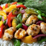 For this dish, you need 1 lb (450g) of chicken breast. Slice it thinly to ensure even cooking. The chicken takes on great flavor during marination, so choose fresh, high-quality meat. 1 cup of dill pickle juice gives the chicken a tangy kick. It helps tenderize the meat and adds a unique taste. The vegetables bring color and crunch to your stir fry. You will use: - 2 cups mixed bell peppers (red, yellow, green), sliced - 1 cup snap peas, trimmed - 1 medium red onion, sliced These veggies not only add nutrition but also make the dish visually appealing. You can also mix in other favorites if you want. To enhance flavor, you need: - 2 tablespoons ranch seasoning mix for that creamy, herby taste. - 1 tablespoon olive oil for cooking the chicken and veggies. - Salt and pepper to taste, adjusting to your preference. These seasonings bring everything together. The ranch seasoning adds a fun twist to the dish. For the full recipe, check [Full Recipe]. Start by slicing 1 pound of chicken breast into thin strips. Place the chicken in a bowl. Pour 1 cup of dill pickle juice over the chicken. This juice adds a tangy flavor that makes the dish special. Cover the bowl and let the chicken marinate for at least 30 minutes. This step helps the chicken absorb all the yummy flavors. After marinating, take the chicken out of the pickle juice. Sprinkle 2 tablespoons of ranch seasoning mix evenly on the chicken. Mix well to coat each piece. Next, heat 1 tablespoon of olive oil in a large skillet over medium-high heat. Add the seasoned chicken to the skillet. Cook for about 5 to 7 minutes. Stir occasionally until the chicken turns golden brown and is cooked all the way through. Once done, remove the chicken from the skillet and set it aside. In the same skillet, add 1 medium sliced red onion. Cook for about 2 minutes until it starts to soften. Then, toss in 2 cups of mixed bell peppers and 1 cup of snap peas. Stir frequently for about 5 minutes. You want the veggies to be tender yet crisp. After that, add 2 cloves of minced garlic and cook for another minute. This makes the kitchen smell amazing! Return the cooked chicken to the skillet. Toss everything together well. Season with salt and pepper to taste. For serving, plate the stir fry over cooked rice or quinoa. Garnish with 1 tablespoon of fresh dill for a pop of color and flavor. You can drizzle extra pickle juice on top for a tangy finish. Enjoy this delightful meal that’s sure to impress! For the complete details, check the Full Recipe. Marinating chicken adds flavor and tenderness. Use dill pickle juice for a tangy kick. Let the chicken soak for at least 30 minutes, but longer is better. This helps the meat absorb all the tasty flavors. If you have time, marinate it overnight in the fridge. Make sure to cover the bowl to keep it fresh. For this stir fry, a large skillet or wok works best. The wide surface lets you cook the chicken and veggies evenly. A wooden spoon or spatula helps mix the food without scratching the pan. Make sure your skillet is hot before adding the chicken. This keeps the meat juicy and prevents sticking. A good cutting board and sharp knife are also key for slicing the veggies. Presentation makes meals more enjoyable. Serve the stir fry in a large bowl to show off the colors. Drizzle extra pickle juice on top for a zesty finish. Add fresh dill as a garnish for a pop of green. For a fun touch, place pickles on the side. This adds crunch and makes the dish look inviting. For the full recipe, check out the Pickle Ranch Chicken and Veggie Stir Fry. {{image_2}} You can switch out chicken for other proteins. Turkey works well. Tofu is great for a plant-based choice. Shrimp adds a nice touch too. Just remember to adjust the cooking time. Each protein brings its own flavor. You can keep the marinade the same for all options. Feel free to mix up the veggies. Broccoli or zucchini can add a new twist. Carrots add crunch and color. You can even use frozen veggies for quick prep. Just thaw them before cooking. This stir fry is flexible, so use what you have. Each veggie will give a different taste and look. Want to change the taste? Try adding different sauces. Soy sauce can add saltiness. Teriyaki gives a sweet twist. You could even use curry paste for a spicy kick. Adding fresh herbs like basil or cilantro can brighten it up. Don't be afraid to experiment! Your taste buds will thank you. For the full recipe, check the section above. After a tasty meal, let the leftovers cool. Place them in an airtight container. Make sure to store them in the fridge. They will stay fresh for up to three days. Label the container with the date. This helps keep track of when to eat them. To reheat, you can use a microwave or a skillet. If using a microwave, place the stir fry in a bowl. Heat it for one to two minutes. Stir halfway through to ensure even warming. If using a skillet, add a splash of water and heat on medium for about five minutes. This keeps the dish moist and tasty. If you want to save some for later, freezing is a great option. Place the cooled stir fry in a freezer-safe container. Make sure to leave some space at the top for expansion. It can last up to three months in the freezer. When you're ready to eat, thaw it overnight in the fridge before reheating. Enjoy your Pickle Ranch Chicken and Veggie Stir Fry even after some time! For the full recipe, check the earlier sections. You can add red pepper flakes to the chicken. Start with a pinch and taste. If you want more heat, add a bit more. You can also use spicy pickles instead of dill pickles. Another option is to add sriracha or hot sauce to the stir fry. These steps will give you a nice kick without changing the dish too much. Yes, you can use other pickles. Bread and butter pickles add a sweet twist. You might also try garlic dill pickles for extra flavor. Different pickles can change the taste, so have fun experimenting. Find the type that best fits your taste buds. Don't hesitate to mix and match! This dish pairs well with cooked rice or quinoa. You can also serve it with a fresh salad on the side. If you like, add crusty bread to soak up the juices. For a lighter option, consider steamed broccoli or a veggie platter. The choice is yours! For the full recipe, check out the complete instructions above. This blog post covered the key ingredients and steps to make a tasty dish. You learned how to marinate chicken, cook it well, and sauté fresh vegetables. We also shared helpful tips for cooking and presenting your meal. If you want to switch things up, you can try different proteins or veggies. Finally, we discussed how to store and reheat your leftovers. With this knowledge, you can create a delicious meal that everyone will enjoy. Happy cooking!