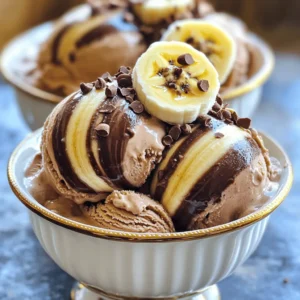 To make Chocolate Swirl Banana Ice Cream, you will need: - 4 ripe bananas, sliced and frozen - 1 cup coconut milk (or any milk of choice) - 2 tablespoons maple syrup (adjust for sweetness) - 1 teaspoon vanilla extract - 1/4 cup cacao powder (or unsweetened cocoa powder) - A pinch of sea salt These ingredients come together to create a creamy and rich treat. The ripe bananas give sweetness, while the cacao powder adds that lovely chocolate flavor. If you have dietary needs, there are easy swaps. For dairy-free options, use almond milk or oat milk instead of coconut milk. You can replace maple syrup with agave syrup or honey for sweetness. Those who avoid sugar may use a sugar substitute like stevia. For the cacao powder, you can use carob powder for a different taste. This ice cream is not only tasty but also has some health benefits. Each serving contains: - Calories: Around 150 - Protein: 2g - Carbohydrates: 30g - Sugar: 12g (natural sugars from bananas) - Fat: 4g This treat is a great way to enjoy dessert while getting some nutrients from the bananas. It’s a fun way to cool down and feel good about what you eat. For the complete recipe, check out the [Full Recipe]. Start by gathering all your ingredients. You will need: - 4 ripe bananas, sliced and frozen - 1 cup coconut milk (or any milk of choice) - 2 tablespoons maple syrup (adjust for sweetness) - 1 teaspoon vanilla extract - 1/4 cup cacao powder (or unsweetened cocoa powder) - A pinch of sea salt Make sure your bananas are ripe. This will make your ice cream sweet and tasty. Slice the bananas and freeze them for a few hours. Now, let's blend! Take the frozen bananas and put them in a blender. Add the coconut milk, maple syrup, vanilla extract, and sea salt. Blend until everything is smooth and creamy. You may need to stop and scrape down the sides of the blender. This helps everything mix well. Once you see a creamy texture, transfer the banana mix to a big bowl. In a different bowl, mix the cacao powder with a splash of coconut milk. Stir until you make a smooth chocolate sauce. If it is too thick, add a little more milk until it is pourable. Now, drizzle the chocolate sauce over the banana mix in the large bowl. Use a spatula to gently swirl the chocolate into the banana mixture. Create those pretty marbled patterns! Once you finish swirling, transfer the mix into an airtight container. Smooth the top with your spatula and cover it tightly. Freeze it for 2-4 hours until it is firm enough to scoop. For the best experience, let the ice cream sit out for about 5 minutes before serving. This makes it easier to scoop. Enjoy the delightful taste of your homemade Chocolate Swirl Banana Ice Cream! Check out the Full Recipe for more details. To get the right texture, freeze your bananas well. I slice them and freeze them overnight. This gives a creamy base. When blending, add coconut milk slowly. Start with a little, then add more if needed. Blend until smooth, but don’t overdo it. If it's too soft, freeze it longer. You can easily boost the flavor of your ice cream. Try adding a pinch of cinnamon. It adds warmth and depth. You can also swap maple syrup for honey or agave. Each sweetener gives a unique taste. For a nutty twist, mix in some almond extract. This brings a fun twist to the classic flavor. Serve your ice cream in chilled bowls. This keeps it cold longer. Scoop it out after letting it sit for five minutes. This makes scooping easier. Top with fresh banana slices and a drizzle of chocolate sauce. For extra crunch, sprinkle cacao nibs on top. This adds texture and looks pretty too. For the full recipe, check the main article. {{image_2}} If you want a dairy-free treat, use coconut milk. It adds creaminess and a light flavor. You can also try almond milk or oat milk. Both work well in this recipe. Just make sure to pick a milk that you enjoy. You can make your ice cream even better with mix-ins. Try adding chopped nuts or shredded coconut. Chocolate chips are also a fun choice. For toppings, fresh fruit, crushed cookies, or granola add texture and flavor. Drizzle extra chocolate sauce on top for a sweet touch. Feel free to get creative with flavors. Add peanut butter for a rich taste. You might also try adding berries like strawberries or raspberries for a fruity twist. A pinch of cinnamon gives a warm note. Each of these options makes your chocolate swirl banana ice cream unique! Remember, you can find the full recipe above. Enjoy making your ice cream! To keep your chocolate swirl banana ice cream fresh, you need to store it right. Here are some tips to help you. First, always let your ice cream cool to room temperature. This helps to avoid ice crystals. After mixing, transfer it to a container. Make sure it’s airtight. This keeps the air out and prevents freezer burn. If you want to enjoy it later, freeze it for up to a month. Use a sturdy container for your ice cream. Glass and plastic containers work well. Make sure the lid fits tightly. This keeps the ice cream safe from other smells in the freezer. If you want to scoop easily, choose a shallow container. It makes it simple to reach every part of the ice cream. Chocolate swirl banana ice cream stays fresh for about two weeks. After that, it can lose flavor and texture. It’s best to eat it within this time frame for the best taste. If it sits too long, it might become icy. Now, you can enjoy your delightful chocolate swirl banana ice cream, knowing how to store it right! For the full recipe, check out the earlier section. To make chocolate swirl banana ice cream, start by blending frozen bananas, coconut milk, maple syrup, vanilla extract, and sea salt. Blend until smooth. Next, mix cacao powder with some coconut milk to create a chocolate sauce. After blending, transfer the banana mix to a bowl. Drizzle the chocolate sauce over it and gently swirl it in. Finally, put the mixture in an airtight container and freeze it for 2-4 hours. For the full recipe, check out the details above. Yes, you can use any milk you like. Almond milk, soy milk, or oat milk work well too. Each type will give a slightly different taste and texture. Choose the milk that fits your diet or taste. Store homemade ice cream in an airtight container. This keeps it fresh and prevents ice crystals. Make sure to smooth the top before sealing to avoid air pockets. It stays fresh in the freezer for about 1-2 weeks. This blog post covered how to make chocolate swirl banana ice cream. We talked about the right ingredients, step-by-step instructions, and helpful tips. You learned how to customize the recipe with different flavors and toppings. I shared storage advice to keep your ice cream fresh. Now you can enjoy a tasty treat that fits your diet. Get ready to impress your friends and family with your new skills!