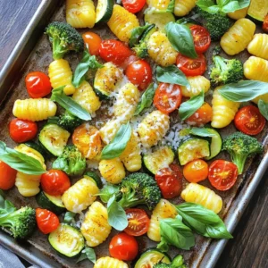 - 1 pound gnocchi (store-bought or homemade) - 1 cup cherry tomatoes, halved - 1 zucchini, sliced into half-moons - 1 bell pepper (red or yellow), chopped - 1 cup broccoli florets - 2 tablespoons olive oil - 2 cloves garlic, minced - 1 teaspoon Italian seasoning - Salt and pepper to taste - 1/4 cup grated Parmesan cheese (optional) - Fresh basil leaves for garnish To make Easy Sheet Pan Gnocchi Primavera, gather these simple ingredients. Start with gnocchi, which you can find at any store. The cherry tomatoes add sweetness. Zucchini and bell pepper give texture and color. Broccoli adds a crunch, balancing the dish. For seasoning, olive oil helps cook the veggies and gnocchi. Garlic brings a bold flavor. Italian seasoning adds a classic taste. Salt and pepper enhance all the flavors. Don’t forget the Parmesan cheese for creaminess! Fresh basil leaves make a lovely garnish. Once you have all your ingredients, you’re ready to create a delicious meal! For the complete recipe, check out the [Full Recipe]. - Step 1: Preheat your oven to 425°F (220°C). This helps cook the gnocchi right. - Step 2: Combine gnocchi, cherry tomatoes, zucchini, bell pepper, and broccoli on a baking sheet. Make sure they mix well for even cooking. - Step 3: Drizzle olive oil and add minced garlic, Italian seasoning, salt, and pepper. This adds great flavor to the dish. - Step 4: Toss and spread everything evenly on the baking sheet. This helps all the ingredients cook at the same time. - Step 5: Roast for 20-25 minutes, stirring halfway through. This step ensures a nice golden color. - Step 6: Sprinkle with Parmesan cheese and garnish with basil before serving. This makes your dish look and taste amazing. Follow these steps closely for a delicious Easy Sheet Pan Gnocchi Primavera. For the full recipe, check out the section above. - Cook gnocchi until golden brown and vegetables are tender. This adds great flavor. - Use parchment paper for easier cleanup. It saves time and keeps your pan clean. - Add red pepper flakes for heat. It gives a nice kick to the dish. - Try different herbs like thyme or rosemary for varied flavor. Fresh herbs can brighten your meal. - Serve directly from the sheet pan for a casual meal. This makes for easy serving and a fun vibe. - Pair with a side salad for a balanced dinner. A light salad complements the warm gnocchi well. For the complete details, check out the Full Recipe. {{image_2}} You can change up the veggies based on your taste. Try replacing the broccoli with asparagus or green beans. These veggies add crunch and flavor. For more greens, toss in baby spinach or kale. They cook down nicely and boost nutrition. Want more protein? You can add cooked chicken, shrimp, or tofu. These ingredients make the dish heartier. If you prefer a vegetarian option, mix in cannellini beans. They are creamy and fill you up. If you want a healthier twist, consider using cauliflower gnocchi. Whole wheat gnocchi is another great option. If gnocchi is not available, try other types of dumplings. They can add a fun new taste to your meal. For the full recipe, check out the Easy Sheet Pan Gnocchi Primavera. To store leftovers, place them in an airtight container. This keeps them fresh. You can keep them in the fridge for up to three days. If you want to save them longer, freeze portions. Use freezer-safe bags or containers. Label them with the date. They can last up to three months in the freezer. To reheat gnocchi, use the oven for best texture. Preheat the oven to 350°F (175°C). Place the gnocchi on a baking sheet. Heat for about 10-15 minutes. Stir halfway through to warm evenly. If you use a microwave, put the gnocchi in a bowl. Heat for 1-2 minutes, stirring once. Be careful not to overheat, as it can change the texture. For easy weeknight meals, prepare ingredients in advance. Chop vegetables and store them in the fridge. You can also cook the gnocchi ahead of time. Keep sauces and garnishes separate to keep them fresh. This way, you can mix and match ingredients as needed. Use these tips to enjoy quick meals all week. If you want to see the full recipe, check the link. Can I use frozen gnocchi for this recipe? Yes, you can use frozen gnocchi. Just toss them straight on the sheet pan. They will cook well and taste great. No need to thaw them first. How can I make this vegan-friendly? To make this dish vegan, skip the Parmesan cheese. You can use nutritional yeast for a cheesy flavor. Also, check that your gnocchi is egg-free. What’s the best way to tell when the vegetables are done? The best way is to check their color and texture. They should be bright and tender, but not mushy. You can poke them with a fork to test. Can I add more vegetables or change the quantities? Absolutely! Feel free to add more veggies like carrots or mushrooms. Just remember to keep the total amount similar so everything cooks evenly. What can I serve with Easy Sheet Pan Gnocchi Primavera? This dish goes well with a fresh salad. You can also serve garlic bread or a light soup. They add flavors and make the meal more filling. How do I store leftovers for the next day? To store leftovers, place them in an airtight container. Keep them in the fridge for up to three days. Reheat in the oven or microwave before serving. This recipe shows how to make a simple sheet pan gnocchi dish. We covered all the main ingredients, seasonings, and step-by-step cooking directions to ensure success. Remember to customize your meal with different veggies, proteins, or gnocchi types. After a quick roast, you can have a delicious dinner ready. Keep it fresh with storage tips for leftovers. Enjoy your cooking and make this dish your own. Each bite is packed with flavor and fun. Happy cooking!