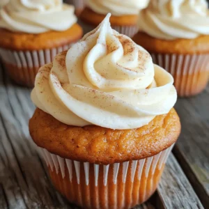 - 1 ¾ cups all-purpose flour - 1 teaspoon baking powder - 1 teaspoon baking soda - 1 teaspoon ground cinnamon - ½ teaspoon ground nutmeg - ½ teaspoon ground ginger - ¼ teaspoon ground cloves - ½ teaspoon salt - ½ cup unsalted butter, softened - 1 cup granulated sugar - 2 large eggs - 1 cup canned pumpkin puree - 1 teaspoon vanilla extract - ½ cup strong brewed coffee, cooled - 1 cup powdered sugar (for frosting) - 4 oz cream cheese, softened (for frosting) - 2 tablespoons milk (for frosting) - Extra cinnamon for dusting When I make Pumpkin Spice Latte Cupcakes, I gather all my ingredients first. This step helps me stay organized. I use all-purpose flour as the base. It gives the cupcakes a light and fluffy texture. Next, I combine baking powder and baking soda. These leavening agents help the cupcakes rise. I add ground spices: cinnamon, nutmeg, ginger, and cloves. These spices give the cupcakes a warm autumn flavor. I always use unsalted butter. Softened butter blends well with sugar. Together, they create a creamy mixture. I then add granulated sugar. This adds sweetness and helps with texture. I include two large eggs for moisture and richness. Canned pumpkin puree is a must. It adds flavor and keeps the cupcakes moist. I also use vanilla extract. It enhances the overall taste. Strong brewed coffee adds depth to the flavor. I let it cool before mixing it in. For the frosting, I use cream cheese and powdered sugar. This makes a creamy and smooth topping. I include a bit of milk to achieve the right consistency. Finally, I like to dust the tops with extra cinnamon. It adds a beautiful touch and boosts the spice flavor. These ingredients come together to create a delightful treat. You can find the Full Recipe for precise measurements and steps. First, preheat your oven to 350°F (175°C). Next, line a cupcake pan with 12 paper liners. This helps with easy removal. In a medium bowl, whisk together the dry ingredients: flour, baking powder, baking soda, cinnamon, nutmeg, ginger, cloves, and salt. Set this aside. In a large bowl, beat the softened butter and granulated sugar until light and fluffy. This takes about 3 to 4 minutes. Add two large eggs, one at a time. Mix well after each egg. Then, stir in the pumpkin puree and vanilla extract until everything is combined. Now, it’s time to mix the dry ingredients with the wet. Gradually add the flour mixture and the cooled brewed coffee. Start and end with the flour mixture. This helps keep the batter smooth. Mix just until combined. Once your batter is ready, fill each cupcake liner about two-thirds full. This allows room for rising. Bake them for 18 to 20 minutes. To check for doneness, insert a toothpick into the center of a cupcake. If it comes out clean, they are ready. Let the cupcakes cool in the pan for a few minutes. Then, transfer them to a wire rack. This helps them cool completely before frosting. For the cream cheese frosting, beat the softened cream cheese in a medium bowl until smooth. Gradually add powdered sugar and milk. Beat until fluffy and well mixed. Once your cupcakes are cool, it’s frosting time! Use a knife or piping bag to frost each cupcake. For an extra touch, dust the tops with cinnamon. This adds a lovely finish to your delightful autumn treat. Enjoy these Pumpkin Spice Latte Cupcakes! For the full recipe, check the earlier section. To make your cupcakes light and fluffy, avoid overmixing. Once you combine the wet and dry ingredients, mix just until you see no flour. This keeps the cupcakes soft. Use a gentle folding motion when adding spices. This way, each bite has balanced flavor without clumps. These cupcakes shine at autumn gatherings. Pair them with a warm cup of coffee or hot cider. For a festive touch, place them on a decorative cake stand. Add some colorful fall leaves around the stand for extra charm. Dust the tops with cinnamon before serving for a lovely look. Watch the baking time closely. Overbaking can make cupcakes dry. Check them a minute or two early. Store your cupcakes in an airtight container. This keeps them fresh and moist. Be mindful of spice levels. Too much can overwhelm the pumpkin flavor. Stick to the recipe for a perfect balance. {{image_2}} To make your pumpkin spice latte cupcakes even better, try adding chocolate chips or nuts. - Chocolate Chips: They add a sweet, rich flavor that pairs well with the spices. - Nuts: Chopped walnuts or pecans bring a nice crunch and extra flavor. If you need a gluten-free option, simply swap the all-purpose flour for a gluten-free blend. Make sure it has a good binding agent like xanthan gum. This way, everyone can enjoy these tasty treats! You can get creative with your frosting too. If you want a dairy-free option, use coconut cream. It gives a nice flavor and texture. - Dairy-Free Frosting: Whip together coconut cream, powdered sugar, and vanilla extract for a smooth finish. You can also play with flavored buttercreams. Try adding a splash of maple or hazelnut extract for an extra twist! For a fun twist, consider making mini cupcakes. They are perfect for parties and easy to eat. You can also bake them as a cake. Just adjust the baking time to 25-30 minutes. When it comes to decorating, think festive! Use colorful sprinkles, edible leaves, or even small pumpkins for a seasonal touch. These little details make your cupcakes look as good as they taste! To keep your pumpkin spice latte cupcakes fresh, store them in an airtight container. This helps prevent them from drying out. You can store them at room temperature for up to three days. If you live in a warm area, you may want to place them in the fridge. Refrigeration can extend their life for about a week, but it may change the texture. If you want to enjoy your cupcakes later, freezing is a great option. To freeze, wrap each cupcake in plastic wrap and then place them in a freezer bag. This protects them from freezer burn. They can stay frozen for up to three months. When you want to eat one, remove it from the bag and let it thaw at room temperature for a few hours. For the best taste, enjoy them while still slightly cool. Pumpkin spice latte cupcakes are best when fresh but can last a bit longer. They stay safe to eat for up to a week if stored properly. Signs of spoilage include a dry texture, off smell, or visible mold. Always check before eating. Enjoy your tasty treats while they are at their best! Yes, you can use fresh pumpkin. Start by roasting a small pumpkin. Once it cools, scoop out the flesh and blend it until smooth. This method can give a richer flavor. Just make sure to measure the same amount as the canned version. Use strong brewed coffee for a bold flavor. A dark roast works well. You can also use espresso for an even richer taste. Just let it cool before mixing it into the batter. To make these cupcakes dairy-free, use plant-based butter and a dairy-free cream cheese for frosting. You can also substitute milk with almond or soy milk. This keeps the flavor while removing dairy. The best way to frost cupcakes is to let them cool completely. Use a piping bag for a neat look. If you don’t have one, a knife works too. Spread the frosting smoothly on top. To make gluten-free cupcakes, replace all-purpose flour with a gluten-free flour blend. Look for one that has a 1:1 ratio for best results. This keeps the texture light and fluffy. To make these cupcakes vegan, use flax eggs instead of regular eggs. For every egg, mix 1 tablespoon of ground flaxseed with 2.5 tablespoons of water. Let it sit until it thickens. Use plant-based milk and butter too. Leftover cupcakes stay fresh for about 3 days at room temperature. Store them in an airtight container. If you want to keep them longer, refrigerate them for up to a week. Always check for signs of spoilage before eating. You now have a complete guide to making the best pumpkin spice latte cupcakes. We covered the key ingredients, step-by-step instructions, and tips for perfect texture. We also explored fun variations and how to store your cupcakes well. Remember, following these steps will lead to delicious cupcakes that impress everyone. Enjoy these treats at your autumn gatherings or whenever you crave a cozy dessert. Let your baking spark joy and share it with those around you. Happy baking!