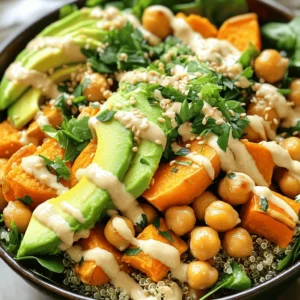 To make Sweet Potato Chickpea Buddha Bowls, gather these simple ingredients: - 2 medium sweet potatoes, peeled and cubed - 1 can (15 oz) chickpeas, drained and rinsed - 2 tablespoons olive oil - 1 teaspoon paprika - 1 teaspoon cumin - Salt and pepper to taste - 2 cups cooked quinoa - 1 avocado, sliced - 2 cups baby spinach or mixed greens - 1/4 cup tahini - 2 tablespoons lemon juice - 1 tablespoon maple syrup - Water, as needed for tahini dressing - Fresh parsley or cilantro for garnish Each ingredient plays a key role in flavor and nutrition. Sweet potatoes bring a natural sweetness and a hearty texture. Chickpeas add protein and fiber, making this bowl filling. Olive oil helps to roast the sweet potatoes and chickpeas, giving them a nice crunch. Spices like paprika and cumin add warmth and depth. Quinoa serves as a nutritious base packed with protein. Avocado gives creaminess, while baby spinach or mixed greens adds freshness. The tahini dressing ties everything together with its rich, nutty flavor. The dressing is easy to make. Mixing tahini, lemon juice, and maple syrup creates a tasty zing. Adjust the thickness with water until it’s just right for drizzling. Make sure to garnish with parsley or cilantro for a fresh touch. With these ingredients, you create a colorful and healthy meal that’s fun to eat. Each bite is a balance of flavors and textures, making it a delightful dish for any occasion. 1. First, preheat your oven to 425°F (220°C). This step helps cook the sweet potatoes perfectly. 2. In a large mixing bowl, toss the cubed sweet potatoes and rinsed chickpeas together. Add 2 tablespoons of olive oil, 1 teaspoon of paprika, 1 teaspoon of cumin, and salt and pepper to taste. Mix until everything is coated well. 3. Next, spread the seasoned sweet potatoes and chickpeas on a baking sheet. Make sure they are in a single layer for even cooking. 1. Roast the mixture in the oven for 25 to 30 minutes. The sweet potatoes should be tender and have a nice caramel color. 2. Stir the sweet potatoes and chickpeas halfway through. This ensures they roast evenly and get that nice crispy texture. 1. While the sweet potatoes and chickpeas roast, prepare the tahini dressing. In a small bowl, mix together 1/4 cup of tahini, 2 tablespoons of lemon juice, and 1 tablespoon of maple syrup. 2. Add a splash of water to the mix. Whisk until smooth. If the dressing is too thick, add a bit more water to reach your desired consistency. 1. For each bowl, start with a base of 2 cups of cooked quinoa. This gives you a hearty and filling foundation. 2. Top the quinoa with the roasted sweet potatoes, chickpeas, fresh baby spinach, and sliced avocado. 3. Drizzle the tahini dressing over each bowl. This adds a creamy and flavorful finish. 4. Finish it off by garnishing with fresh parsley or cilantro. This adds a pop of color and flavor. - Best practices for cutting sweet potatoes: Cut sweet potatoes into even cubes. This helps them cook at the same rate. Aim for about 1-inch pieces. This size ensures they roast nicely and become tender. - How to ensure even cooking: Spread the sweet potatoes and chickpeas in a single layer on the baking sheet. This allows hot air to reach all sides. Stir them halfway through roasting to promote browning. - Alternatives to tahini: If you don’t have tahini, try almond butter or sunflower seed butter. These options give a creamy texture and rich flavor. You can also use yogurt for a tangy twist. - Flavor enhancers for the dressing: Add garlic powder, a splash of soy sauce, or a pinch of cayenne for extra flavor. Fresh herbs like dill or cilantro can brighten the dressing, too. - Arranging bowls for visual appeal: Start with a base of quinoa and layer the ingredients in sections. Use colorful veggies to make the bowl pop. This creates a beautiful and inviting meal. - Garnishing ideas: Top your bowl with fresh herbs like parsley or cilantro. Sprinkle sesame seeds or hemp seeds for added crunch. A drizzle of extra dressing can make it even more appealing. {{image_2}} You can change your base for these bowls. Instead of quinoa, try brown rice or farro. Both add great texture. You can also switch up the vegetables. Try roasted carrots, zucchini, or bell peppers. For added protein, consider adding tofu or edamame. These swaps can keep your meals exciting and fresh. This dish is vegan-friendly. You can enjoy it without animal products. If you're gluten-free, use quinoa or rice as your base. Make sure to check all your ingredients, like tahini, for gluten. These options make it easy for anyone to enjoy a healthy meal. You can add seasonal ingredients to your Buddha bowls. In spring, try fresh peas or asparagus. In summer, add cherry tomatoes or corn. For fall, consider roasted Brussels sprouts or butternut squash. In winter, you might enjoy kale or root vegetables. Fresh herbs like basil or dill can also enhance flavors. They add a burst of freshness to your dish. To keep your Sweet Potato Chickpea Buddha Bowls fresh, store leftovers in the fridge. Use airtight containers to prevent moisture loss. They can stay good for up to three days. If you have extra tahini dressing, store it separately. This will keep the greens from wilting. For long-term storage, you can freeze the bowls. Keep the quinoa and veggies in one container and the tahini dressing in another. This way, you preserve the taste and texture. You can freeze the bowls for up to a month. When you are ready to enjoy your Buddha bowls, reheat them gently. The best way is to use the microwave. Heat for about one to two minutes, stopping to stir halfway. If you prefer the oven, preheat it to 350°F (175°C). Place the bowls in there for about 10-15 minutes. To maintain texture and flavor, cover the bowls with foil in the oven. This keeps moisture inside. If the tahini dressing is cold, you can warm it up in a small bowl. Just add a splash of water and stir until smooth. Enjoy your meal! A Buddha bowl is a colorful and wholesome meal. It usually has a base of grains, like quinoa. You then add a variety of veggies, proteins, and toppings. Common ingredients include leafy greens, roasted vegetables, and beans. The mix of flavors and textures makes it fun to eat. Yes, you can prepare these bowls in advance. Start by roasting the sweet potatoes and chickpeas. Store them in a container in the fridge. You can also cook quinoa ahead of time. When ready to eat, just assemble the bowls. This saves time on busy days. Sweet potatoes are high in fiber and vitamins. They help with digestion and keep you full. Chickpeas provide protein and iron. These nutrients support muscle health and energy. Combining them in a bowl gives you a balanced meal. You get vitamins, minerals, and protein all in one dish. You can change many things in your Buddha bowl. Try different grains like brown rice or farro. Add seasonal veggies like bell peppers or zucchini. For protein, try grilled chicken or tofu. You can also switch up the dressing. Use yogurt or a spicy sauce for a twist. Make it your own! In this blog post, we covered how to make Sweet Potato Chickpea Buddha Bowls. We started with the ingredients needed, like sweet potatoes and chickpeas. Next, we went through the step-by-step process from roasting to assembling the bowls. I shared useful tips to improve your cooking and help with presentation. We also explored variations and how to store leftovers. Now, it’s your turn to make these tasty bowls. They are healthy, easy, and fun to customize. Enjoy creating your perfect Buddha bowl!