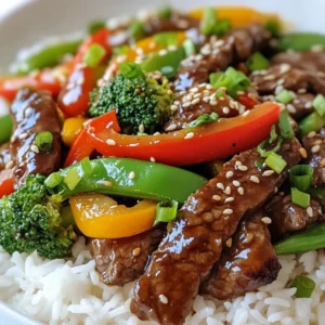 To make a tasty Teriyaki Steak Stir Fry, gather these ingredients: - 1 lb (450g) sirloin steak, thinly sliced against the grain - 2 tablespoons soy sauce - 2 tablespoons mirin (you can use apple juice if you like) - 1 tablespoon sesame oil - 2 cloves garlic, minced - 1 inch ginger, grated - 1 bell pepper (red or green), sliced - 1 cup broccoli florets - 1 cup snap peas - 2 green onions, chopped - Sesame seeds for garnish - Cooked jasmine rice or noodles for serving If you need to swap some ingredients, here are a few ideas: - Steak: You can use chicken, pork, or tofu if you prefer. Each option gives a different taste. - Mirin: If you don’t have mirin, apple juice works well. It adds a touch of sweetness. - Sesame oil: Olive oil or canola oil can substitute in a pinch, but sesame oil adds a unique flavor. - Vegetables: Feel free to mix in bell peppers, carrots, or zucchini. They all taste great in stir fry. I often use fresh vegetables for the best flavor and crunch. Fresh veggies also hold their color better. However, frozen vegetables can save time. They are pre-cut and ready to cook. Just make sure to thaw them first and pat them dry. This way, they won’t release too much water in the pan. Overall, both choices can work well, but fresh gives a better taste. {{ingredient_image_1}} First, we need to make the marinade. In a bowl, mix together: - 2 tablespoons soy sauce - 2 tablespoons mirin (or apple juice) - 1 tablespoon sesame oil - 2 cloves garlic, minced - 1 inch ginger, grated Next, add the thinly sliced sirloin steak to the bowl. Make sure every piece is covered in the marinade. Cover the bowl and let it sit for at least 15 minutes. This step helps the steak soak up the flavor. Heat a large wok or skillet over medium-high heat. Add a tablespoon of oil once the pan is hot. Remove the steak from the marinade, but keep that marinade for later. Stir-fry the steak in the pan for about 2-3 minutes. You want it browned but not fully cooked. Once done, take it out and set it aside. In the same pan, add sliced bell pepper and broccoli florets. Stir-fry them for about 3-4 minutes. You want them to soften a bit but still be bright and crunchy. Next, add the snap peas. Stir everything for another 2 minutes. This keeps the veggies fresh and vibrant. Now it’s time to bring it all together. Add the steak back into the pan along with the reserved marinade. Toss everything together. Cook for another 2-3 minutes until the steak is fully cooked and the sauce thickens slightly. Once done, remove the pan from heat. Garnish with chopped green onions and sesame seeds. Serve hot over jasmine rice or noodles for a satisfying meal. To make a great stir fry, you need high heat. Use a wok or a large pan. This helps cook the food fast. Cut your steak and veggies into small pieces. This ensures even cooking. Stir constantly so nothing burns. This keeps the flavors fresh and bright. To get tender steak, slice it thin. Always cut against the grain. Marinating the steak helps it soak up flavors. Use soy sauce, mirin, and sesame oil for a great mix. Let it marinate for at least 15 minutes. This makes the steak juicy and full of flavor. Garnishing adds a nice touch to your meal. Use chopped green onions for color and taste. Sesame seeds add crunch and look great. You can also add fresh herbs like cilantro. These simple touches make your dish look fancy and inviting. Pro Tips Marinating Time: Allow the steak to marinate for at least 30 minutes for deeper flavor, or even overnight for a more intense teriyaki taste. Vegetable Crunch: To maintain the vibrant color and crunch of your vegetables, avoid overcooking them; they should be tender yet crisp. Serving Suggestions: This stir fry pairs beautifully with jasmine rice or noodles, but can also be served over a bed of fresh greens for a lighter option. Sesame Oil Tip: For an extra nutty flavor, consider drizzling a bit of toasted sesame oil over the dish just before serving. {{image_2}} You can mix in many veggies for your Teriyaki Steak Stir Fry. Broccoli, bell peppers, and snap peas are great choices. But why stop there? Try adding carrots, mushrooms, or zucchini. Each veggie brings its own taste and texture. You can also use frozen veggies if you are short on time. They cook quickly and taste good too! While the classic teriyaki sauce is tasty, you can switch it up. Consider using hoisin sauce for a sweeter kick. You can also try a simple soy sauce and honey mix. For a tangy twist, add some lime juice or rice vinegar. This keeps the dish fresh and exciting. You could even use a store-bought sauce if you need a quick option. If you like heat, add some spice to your stir fry. You can mix in some red pepper flakes or chili paste. Sriracha is a fun choice for a little extra kick. Start with a small amount and taste as you go. You can always add more, but you can't take it out! This will give your Teriyaki Steak Stir Fry a nice, spicy edge. You can store your Teriyaki Steak Stir Fry in an airtight container. Let it cool first. Keep it in the fridge for up to three days. This quick meal tastes great even after a day or two. To reheat, use a skillet over low heat. Add a splash of water or oil to keep it moist. Stir often for even heating. You can also use the microwave. Heat in short bursts to avoid overcooking. If you want to freeze it, use a freezer-safe bag. Remove as much air as you can. It will stay fresh for up to three months. Thaw it overnight in the fridge before reheating. Remember, the veggies may lose some crunch after freezing. Yes, you can use both chicken and tofu. For chicken, slice it thinly like the steak. Use chicken breast or thighs for the best taste. For tofu, choose firm or extra-firm. Press the tofu to remove excess water before slicing. Marinate it just like the steak. Both options will soak up the teriyaki flavor well. To make this dish gluten-free, swap regular soy sauce for gluten-free soy sauce. Tamari is a great choice. Make sure to check labels on mirin or use a gluten-free sweet rice wine. You can also use apple juice as a substitute. This way, you keep the dish tasty and gluten-free. Teriyaki Steak Stir Fry tastes great with many sides. Here are some ideas: - Cooked jasmine rice - Noodles, like udon or soba - Steamed white rice - A fresh salad with sesame dressing - Roasted or steamed vegetables These sides will complement the stir fry and add more flavor. You can keep leftovers in the fridge for about 3 to 4 days. Make sure to store them in an airtight container. To keep the flavors fresh, reheat in a pan or microwave. Stir well to distribute heat evenly. Enjoy your delicious leftovers! In this post, we covered how to make Teriyaki Steak Stir Fry. You learned about key ingredients, marinating, and cooking tips. We also discussed variations, storage, and common questions. Overall, this dish offers flavor and ease. You can mix in different veggies or sauces. With simple steps and helpful tips, anyone can enjoy this meal. Happy cooking!