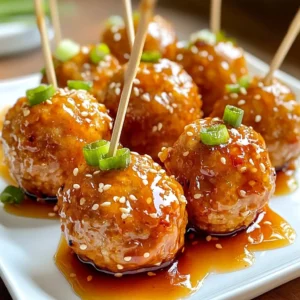 - 1 lb ground turkey - 1/4 cup breadcrumbs - 1/4 cup grated Parmesan cheese - 2 cloves garlic, minced - 1 tablespoon fresh ginger, minced - 1/4 teaspoon salt - 1/4 teaspoon black pepper - 1/4 cup honey - 2 tablespoons Sriracha sauce - 1 tablespoon soy sauce or tamari - 1 tablespoon rice vinegar - 1 tablespoon sesame oil The main ingredients form the base of these meatballs. Ground turkey gives them a light texture. Breadcrumbs help bind the meatballs together, while Parmesan adds a savory kick. For flavor, garlic and ginger are essential. They bring warmth and depth. Salt and pepper enhance all the tastes, creating a balanced dish. Honey and Sriracha give the meatballs their sweet and spicy character. Optional ingredients can elevate the dish. Soy sauce or tamari adds umami, while rice vinegar brings brightness. Sesame oil adds a nutty finish. Together, they make a flavor-packed meal. You can mix and match these ingredients to suit your taste. Feel free to swap in your favorite options. Enjoy creating your own twist on these tasty meatballs! {{ingredient_image_1}} - Preheat the oven to 400°F (200°C). - Line a baking sheet with parchment paper. Start by setting your oven to the right temperature. This step helps the meatballs cook evenly. Lining the baking sheet with parchment paper makes cleanup easy and helps prevent sticking. - Combine all main ingredients in a bowl. - Avoid overmixing the meat. In a large bowl, mix ground turkey, breadcrumbs, Parmesan cheese, and chopped green onions. Add the beaten egg, minced garlic, minced ginger, salt, and black pepper. Stir the mixture until just combined. Mixing too much can make the meatballs tough, so be gentle! - Shape and place meatballs on the baking sheet. - Prepare and glaze with honey Sriracha sauce. - Bake until golden and caramelized. Form the mixture into 1-inch meatballs and place them on the baking sheet. In a small bowl, whisk together honey, Sriracha, soy sauce, rice vinegar, and sesame oil. Brush this sauce onto the meatballs in the last five minutes of baking. Bake for 15-18 minutes, or until they are golden and reach an internal temperature of 165°F (74°C). The glaze adds a sweet and spicy touch that makes these meatballs special. To keep your meatballs moist, use ground turkey with a bit of fat. This helps with juiciness. You can also add a splash of soy sauce to the mix for extra moisture. When mixing the meat, don’t overwork it. Combine ingredients just until they blend. If you mix too much, the meatballs can become tough. Timing is key for glazing. Apply the honey Sriracha sauce in the last five minutes of baking. This gives the sauce time to stick and caramelize. To achieve the perfect caramelization, look for a golden color on your meatballs. This means the sugars in the sauce are doing their magic. For a great meal, serve your meatballs with steamed rice or a crisp salad. Both pair well and add balance. Presentation matters too. Arrange the meatballs on a platter with chopped green onions and sesame seeds. Add toothpicks for easy eating. This makes your dish look even more inviting! Pro Tips Fresh Ingredients: Using fresh garlic and ginger will enhance the flavor of the meatballs significantly. Always prefer fresh over pre-minced for the best taste. Meatball Size: For even cooking, ensure all meatballs are uniform in size. A 1-inch diameter is ideal for quick baking without drying out. Glaze Timing: Applying the glaze during the last few minutes of baking allows it to caramelize properly without burning, giving you a delicious finish. Serving Suggestions: Serve these meatballs with a side of steamed rice or a fresh salad to balance the flavors and add texture to your meal. {{image_2}} You can swap ground turkey for other meats. Ground chicken works well and is lean. If you prefer beef, use ground beef. For a lighter option, turkey is great. You can also try vegetarian meatballs. Use lentils or chickpeas to create a hearty base. Crushed beans mixed with breadcrumbs make a tasty vegan option. Adjust the heat to match your taste. If you like it spicy, add more Sriracha. For a milder flavor, use less. You can also mix in herbs, like cilantro or parsley. Try adding spices like cumin or paprika for new tastes. Each change adds a unique twist to your meatballs. You can serve these meatballs in many ways. As appetizers, they are fun on toothpicks. Serve with a dipping sauce for a party. For a main course, pair them with rice or pasta. You can also drizzle extra sauce on top. Try serving them with a fresh salad or veggies for balance. To store leftovers, place the meatballs in an airtight container. This keeps them fresh and tasty. You can also cover them with plastic wrap. They will last in the fridge for about 3 to 4 days. Make sure to let them cool before sealing. For freezing, let the meatballs cool completely. Then, place them in a single layer on a baking sheet. Freeze them for about an hour until solid. Once frozen, transfer them to a freezer bag. They will stay good for about 3 months. When reheating frozen meatballs, thaw them in the fridge overnight. Heat them in the oven or microwave until hot. You can prep these meatballs ahead of time. Form and freeze them for quick meals later. Just bake them straight from the freezer. For easy reheating, warm them with a bit of sauce to keep them moist. This way, you have a delicious meal ready in no time. Bake the honey Sriracha turkey meatballs for 15 to 18 minutes at 400°F (200°C). This heat helps the meatballs cook evenly and get a nice golden brown color. To ensure they are done, check that the internal temperature reaches 165°F (74°C). A quick tip: keep an eye on them during the last few minutes to avoid burning. Yes, you can use other sweeteners if needed. Maple syrup or agave nectar work well. If you want a sugar-free option, try using monk fruit sweetener or erythritol. Each of these alternatives can add a unique flavor. Just remember that the taste may differ slightly from using honey. These meatballs pair well with various sides. Here are a few ideas: - Steamed rice for a filling meal. - A fresh salad for a light option. - Zucchini noodles for a low-carb choice. - Roasted vegetables for added color and flavor. You can also serve them as appetizers with toothpicks for easy eating at parties. Enjoy mixing and matching! In this blog post, we explored making honey Sriracha turkey meatballs. We covered key ingredients like ground turkey and seasonings such as garlic and ginger. You learned how to mix, shape, and bake meatballs to perfection. Using tips, we discussed storage options and creative variations. These meatballs can be a tasty main dish or fun appetizer. Remember, feel free to adjust flavors to match your taste. Enjoy your cooking adventures and serve delicious meals with these easy recipes!