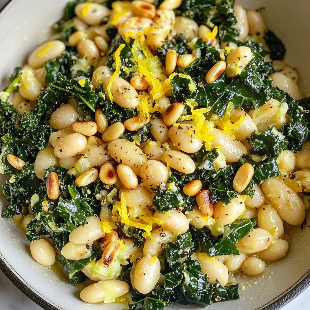 To make a tasty Tuscan kale white bean skillet, gather these simple ingredients: - Tuscan kale (1 bunch) - White beans (1 can, 15 oz) - Onion (1 medium, diced) - Garlic (3 cloves, minced) - Red pepper flakes (1 teaspoon) - Vegetable broth (1 cup) - Olive oil (2 tablespoons) - Salt and pepper to taste - Lemon (1, zested and juiced) - Grated Parmesan cheese (optional, for serving) - Toasted pine nuts (for garnish) These ingredients come together to create a dish that is not just easy to make, but also packed with flavor. The Tuscan kale adds a rich, earthy taste. The white beans provide a creamy texture and protein. The garlic and onion give a savory base, while the lemon zest adds brightness. Use fresh ingredients for the best taste. Enjoy the process of cooking with these vibrant ingredients! {{ingredient_image_1}} - Warm 2 tablespoons of olive oil over medium heat in a large skillet. - Sauté 1 medium diced onion for about 5 minutes until it becomes translucent. - Incorporate 3 minced garlic cloves and 1 teaspoon of red pepper flakes. - Cook for another minute until you smell the fragrant mix. - Add 1 bunch of chopped Tuscan kale and 1 cup of vegetable broth. - Cover the skillet and let the kale wilt for about 4-5 minutes. - Stir in 1 can (15 oz) of drained white beans, along with lemon zest and juice. - Season with salt and pepper to taste, then warm through for 3-4 minutes. How to choose fresh Tuscan kale When you pick Tuscan kale, look for vibrant green leaves. Avoid yellow or brown spots. The leaves should feel firm and crisp. Fresh kale has a slight sheen, showing it’s full of moisture. Choose a bunch with thick stems for the best flavor and texture. Adjusting spice level with red pepper flakes Red pepper flakes add a nice kick to this dish. Start with one teaspoon if you like mild heat. For more spice, feel free to add more. Mix the flakes with the garlic for a burst of flavor. Just remember, a little goes a long way, so taste as you go. Ideas for presenting the dish Serving this dish can be fun and simple. You can place the skillet right on the table. This gives a warm, rustic feel. Alternatively, serve it in individual bowls for a personal touch. Drizzle some olive oil and add extra lemon zest for brightness before serving. Optional garnishes for enhanced flavor To make this dish even better, consider garnishing it. Toasted pine nuts add a lovely crunch. Grated Parmesan cheese brings a rich flavor. You can also sprinkle fresh herbs like parsley or basil for a fresh touch. These little extras elevate the overall taste. Pro Tips Fresh Kale Matters: For the best flavor and texture, use fresh Tuscan kale. Look for vibrant, dark green leaves without any yellowing or wilting. Enhance the Flavor: Consider adding a splash of balsamic vinegar or a pinch of smoked paprika for an extra depth of flavor that complements the beans and kale. Perfectly Toasted Nuts: Toast your pine nuts in a dry skillet over low heat for a few minutes until golden brown. This brings out their natural oils and enhances their nutty flavor. Meal Prep Friendly: This dish stores well in the refrigerator for up to 3 days. Reheat gently to enjoy as a quick meal or side dish throughout the week. {{image_2}} To make this dish vegan, skip the Parmesan cheese. You can add nutritional yeast for a cheesy flavor. For gluten-free needs, ensure the vegetable broth is certified gluten-free. Most brands are safe. You can easily boost protein by adding chicken or sausage. Just cook it first in the skillet. Once it's done, follow the main recipe steps. You can also add other veggies like bell peppers or carrots. They add color and nutrients. Mix in some cherry tomatoes for sweetness. Just toss them in with the kale for extra flavor. To store your Tuscan kale white bean skillet, let it cool first. Place it in a sealed container. Keep it in the fridge for up to three days. If you want to keep it longer, you can freeze it. Use a freezer-safe container or bag. This way, it can last for up to three months. When you are ready to eat, you can reheat it in a pan. Heat it over medium heat for about 5 to 7 minutes. Stir it often to keep it from sticking. You can also use a microwave. Heat it in short bursts of 1 to 2 minutes. Stir between bursts to ensure even warming. Aim for 165°F to keep it safe and tasty. Tuscan kale lasts about 5 to 7 days in the fridge. Keep it in a bag or container. Make sure it is dry to prevent wilting. Yes, you can make this dish ahead of time. It stores well in the fridge for up to 3 days. Reheat it gently on the stove or in the microwave. This helps keep the flavors fresh. Kale is rich in vitamins A, C, and K. It also has antioxidants that help fight disease. White beans provide protein and fiber. They help with digestion and can keep you full longer. Together, they make a healthy, balanced meal. In this blog post, we explored how to make a nutritious dish featuring Tuscan kale and white beans. I shared ingredients, step-by-step instructions, and valuable tips to enhance your cooking. Remember, you can adapt the recipe for different diets and store leftovers properly. Enjoy this simple dish packed with flavor and health benefits. I hope you try this recipe and make it your own! Happy cooking!